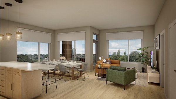 Spacious living room with modern furnishings in The Blake Apartments