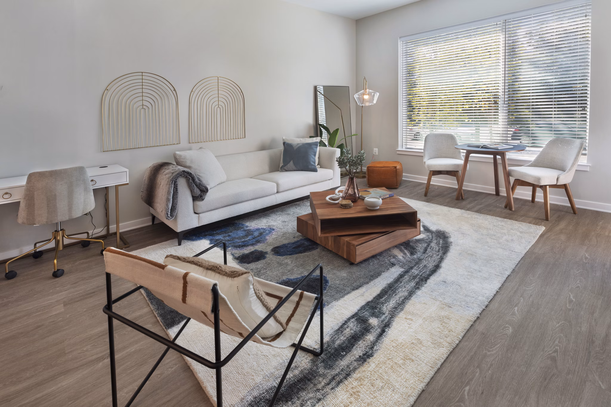 Spacious living room with stylish decor in The Blake Apartments