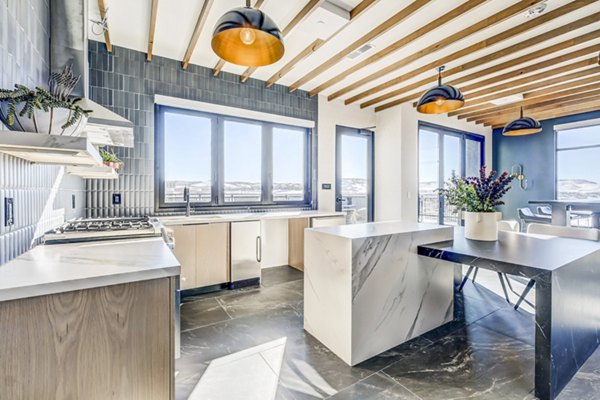 Clubhouse featuring modern lounge areas at Novus Apartments with luxury amenities