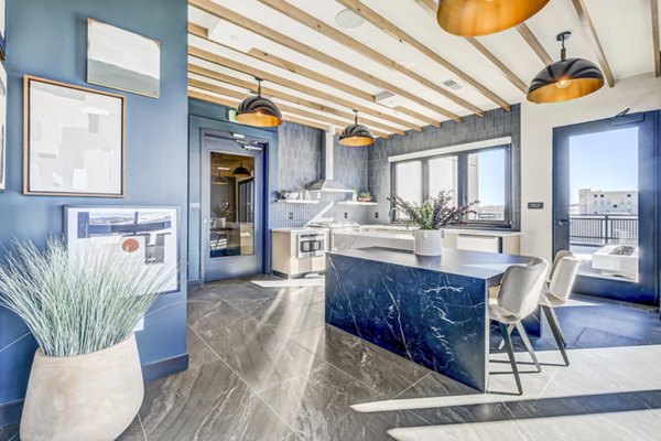 Modern clubhouse with cozy seating areas at Novus Apartments