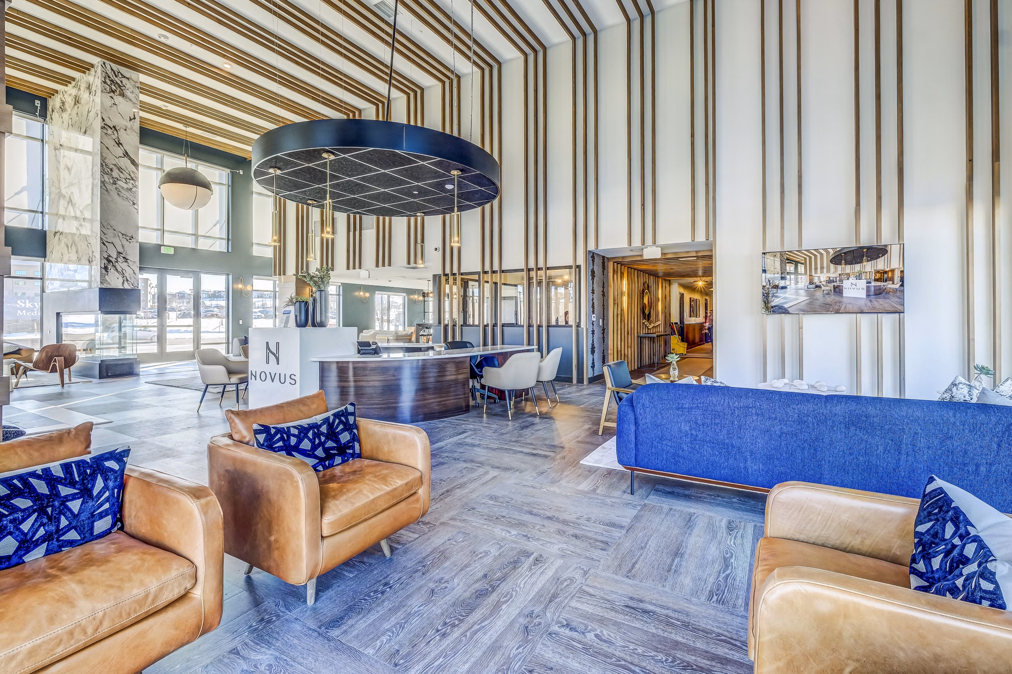 Clubhouse at Novus Apartments: Modern lobby with elegant seating and contemporary design