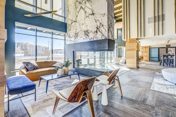 Clubhouse lobby featuring modern design and seating at Novus Apartments