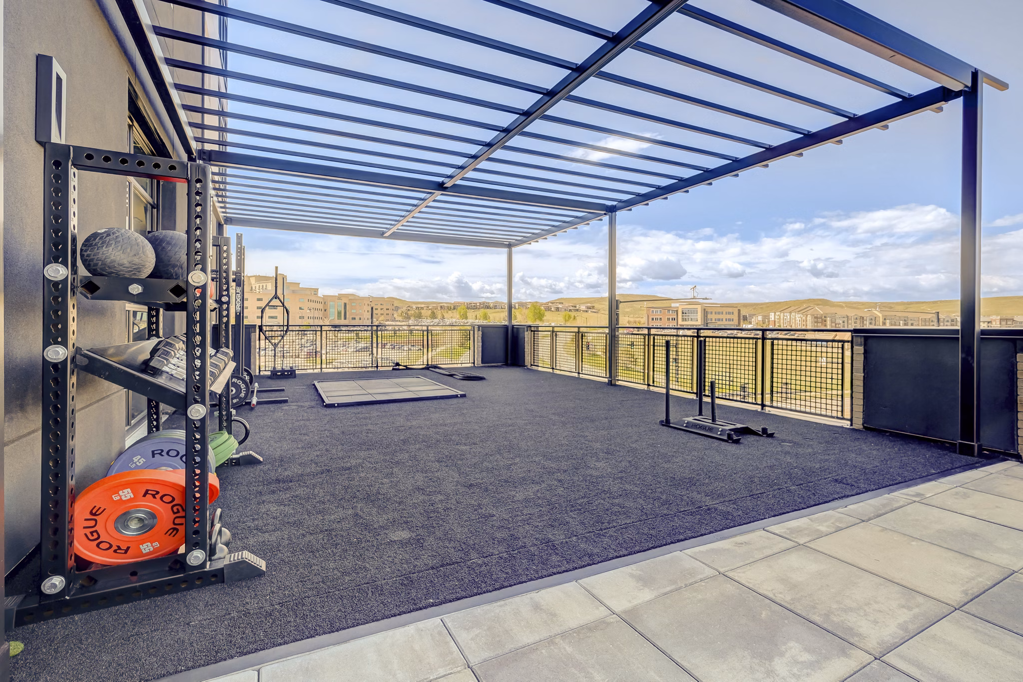 Modern fitness center with state-of-the-art equipment at Novus Apartments