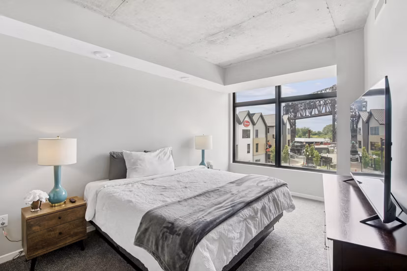 bedroom at The Flats at East Bank Apartments