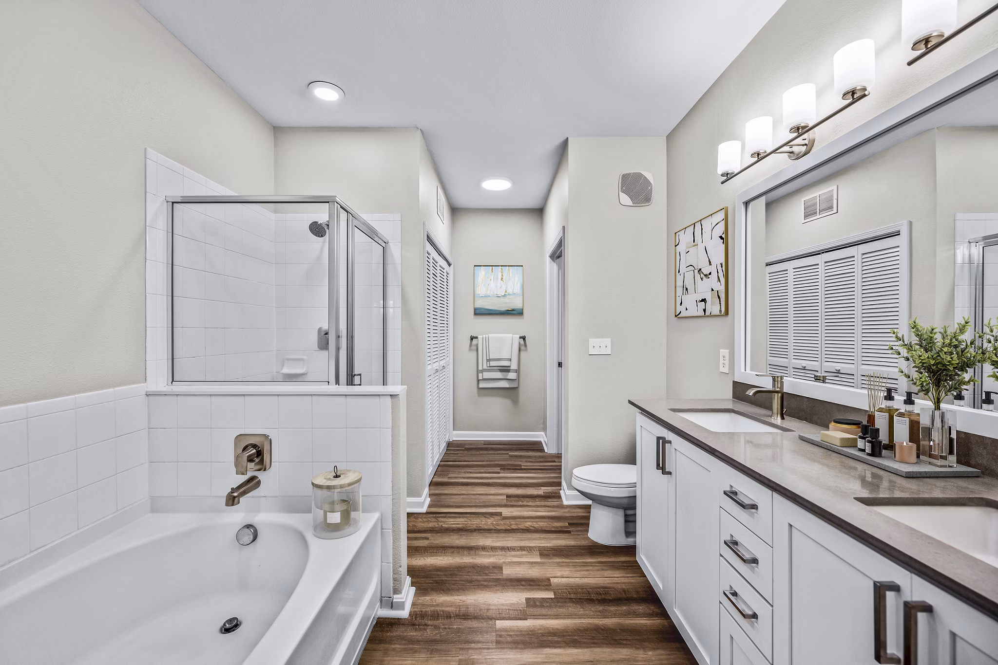 Bathroom with elegant fixtures at The Avens at Dedham Station Apartments