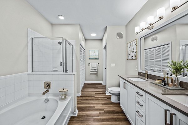 Bathroom with elegant fixtures at The Avens at Dedham Station Apartments