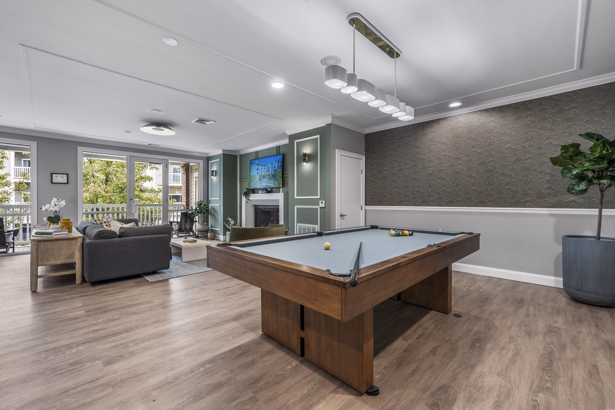 game room at The Avens at Dedham Station Apartments