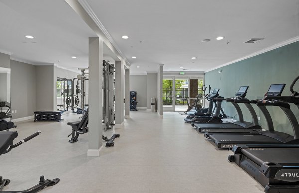 State-of-the-art fitness center with modern equipment at The Avens Dedham Station Apartments