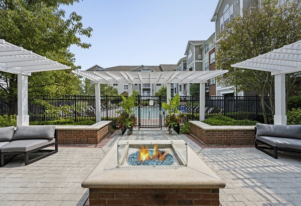 fire pit at The Avens at Dedham Station Apartments