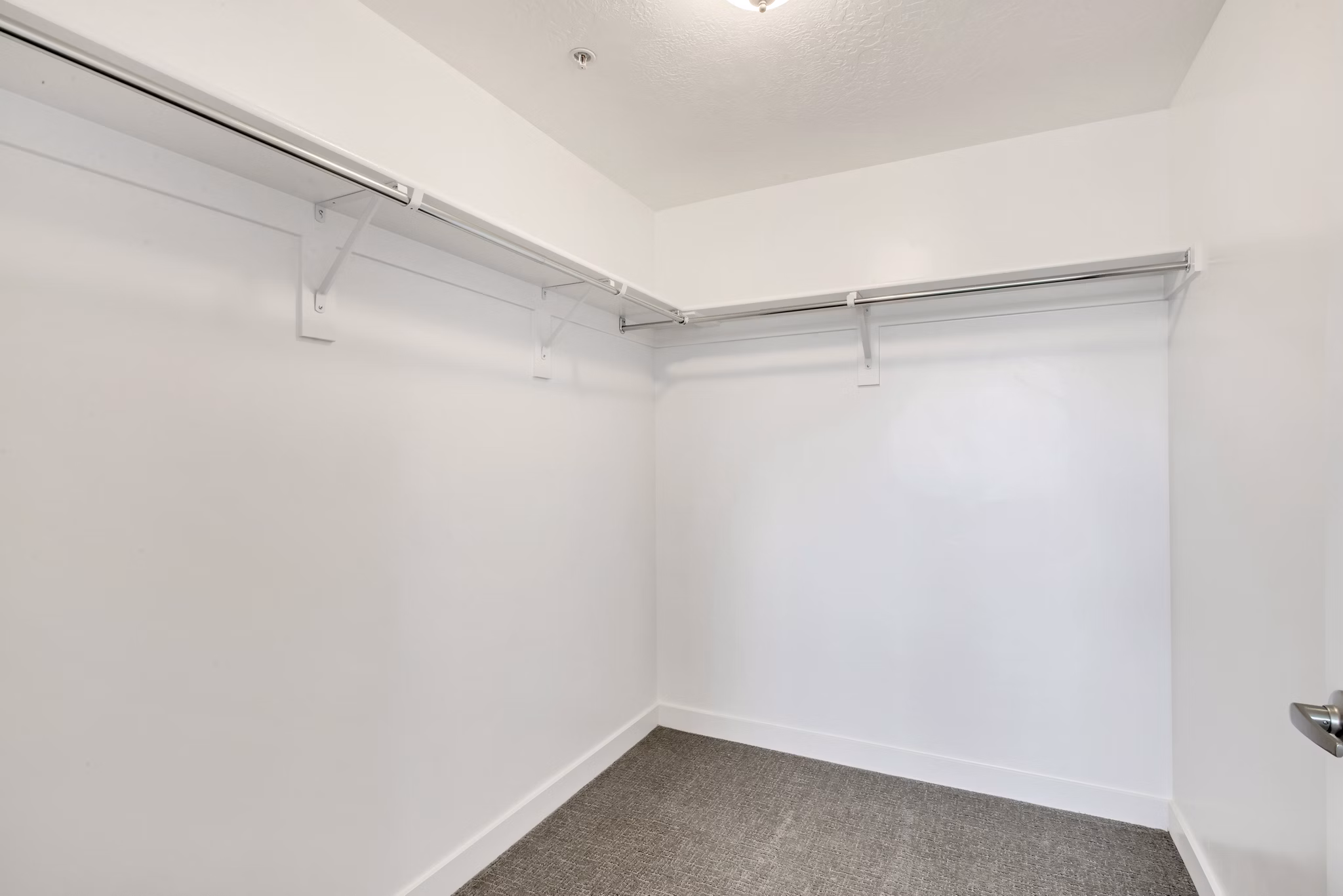 Organized closet with built-in shelves at Millpond Apartments