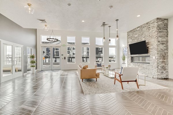 Cozy clubhouse with modern furnishings at Millpond Apartments