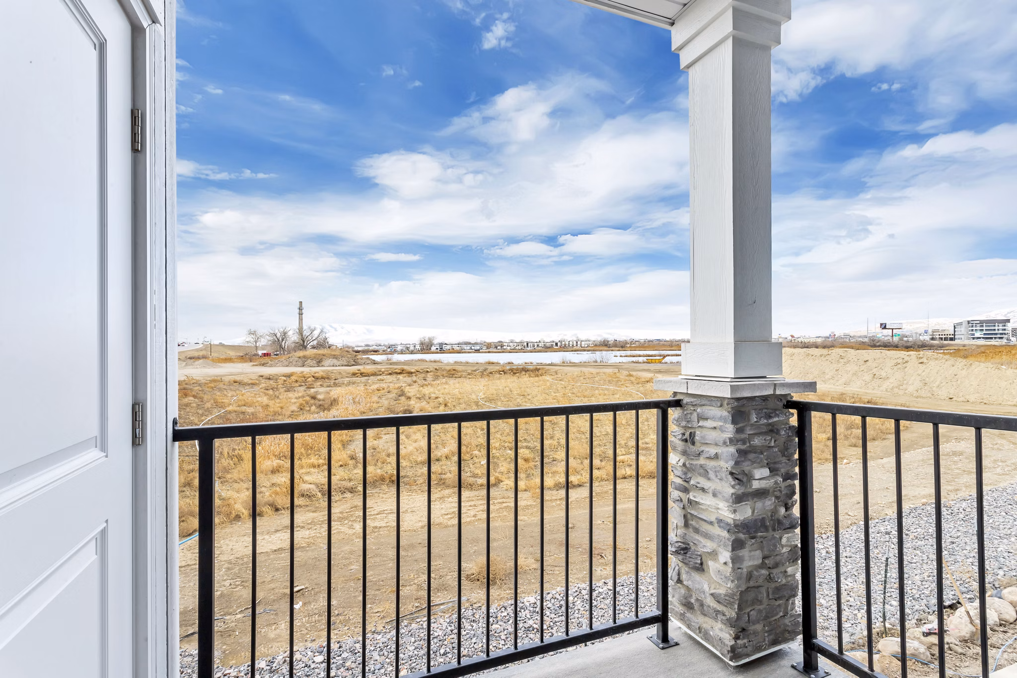 Charming patio with outdoor seating at Millpond Apartments