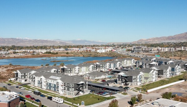 Millpond Apartments: Scenic view of luxury high-rise apartments in a vibrant urban setting