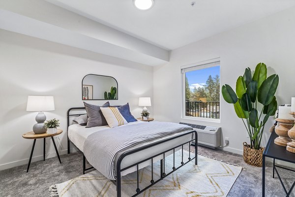 bedroom at The Oliveen Apartments