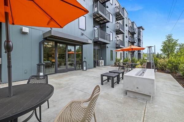 fire pit/patio at The Oliveen Apartments
