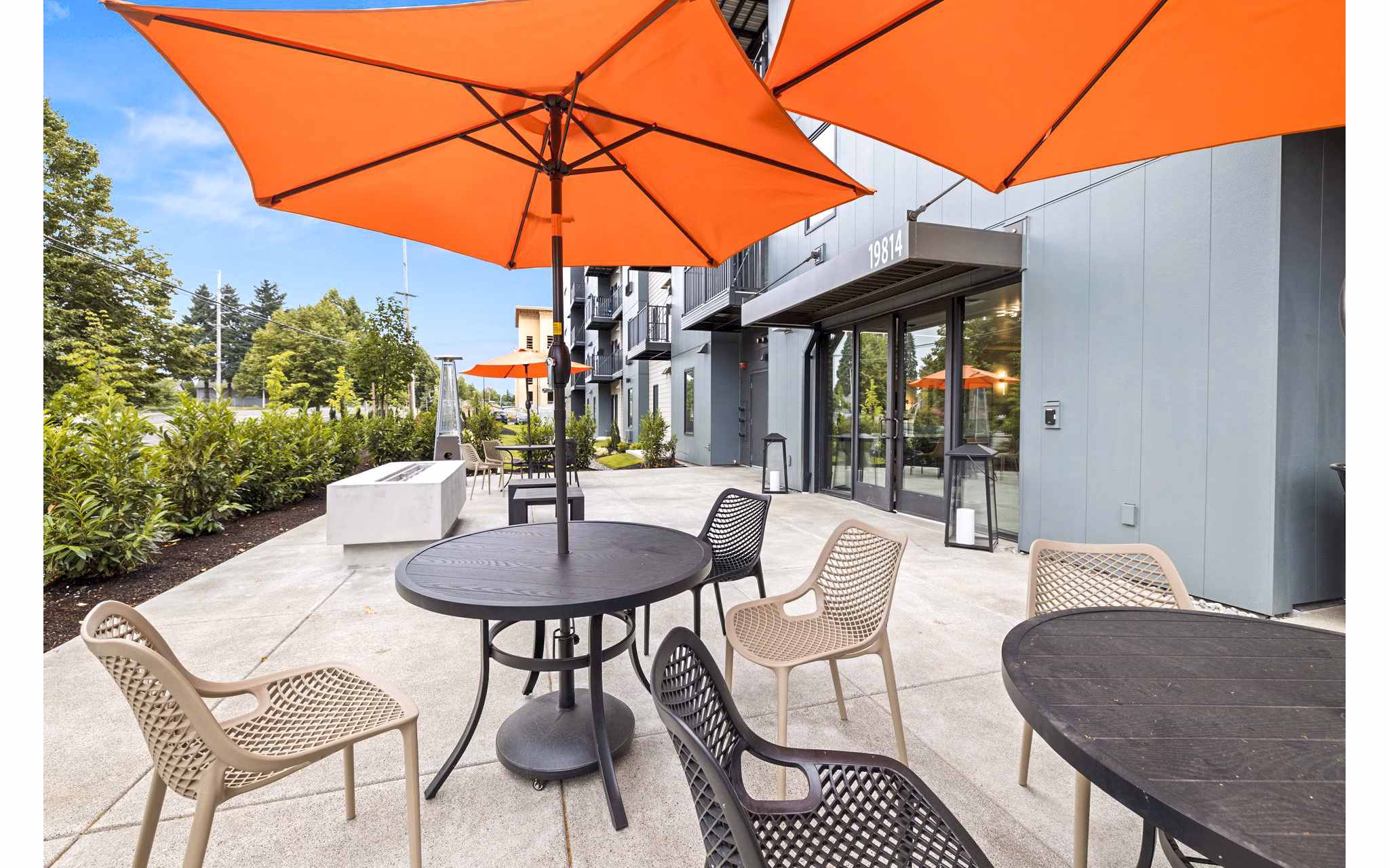 Cozy fire pit on patio at The Oliveen Apartments