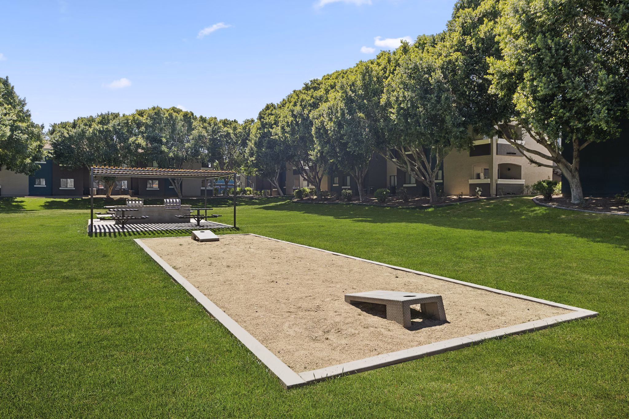 Modern sport court with vibrant court markings at Morada Rise Apartments offering recreational spaces for active lifestyles