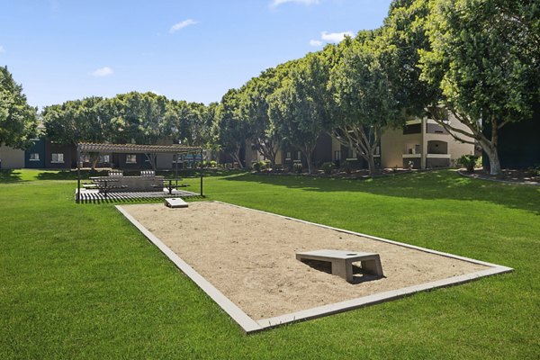 Modern sport court with vibrant court markings at Morada Rise Apartments offering recreational spaces for active lifestyles