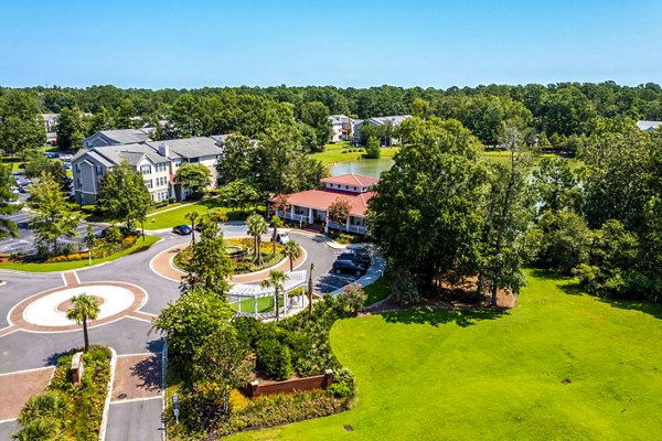 The Reserve at Wescott: Elegant of luxury apartments in Summerville, showcasing modern architecture and pristine landscaping