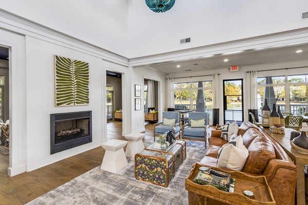 The Reserve at Wescott Apartments: Stylish clubhouse with modern furnishings and open lounge areas