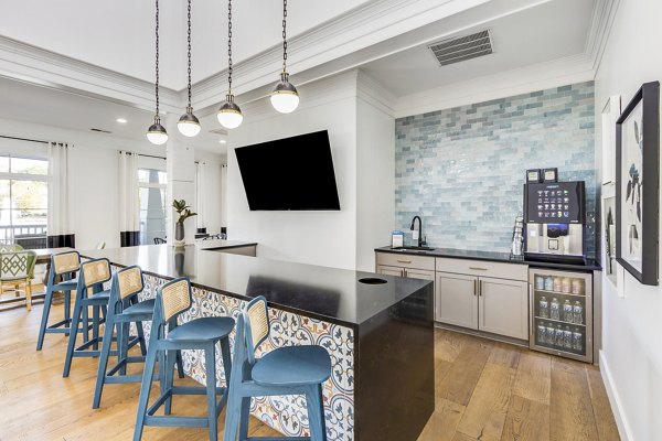 Stylish clubhouse with modern seating at The Reserve at Wescott Apartments