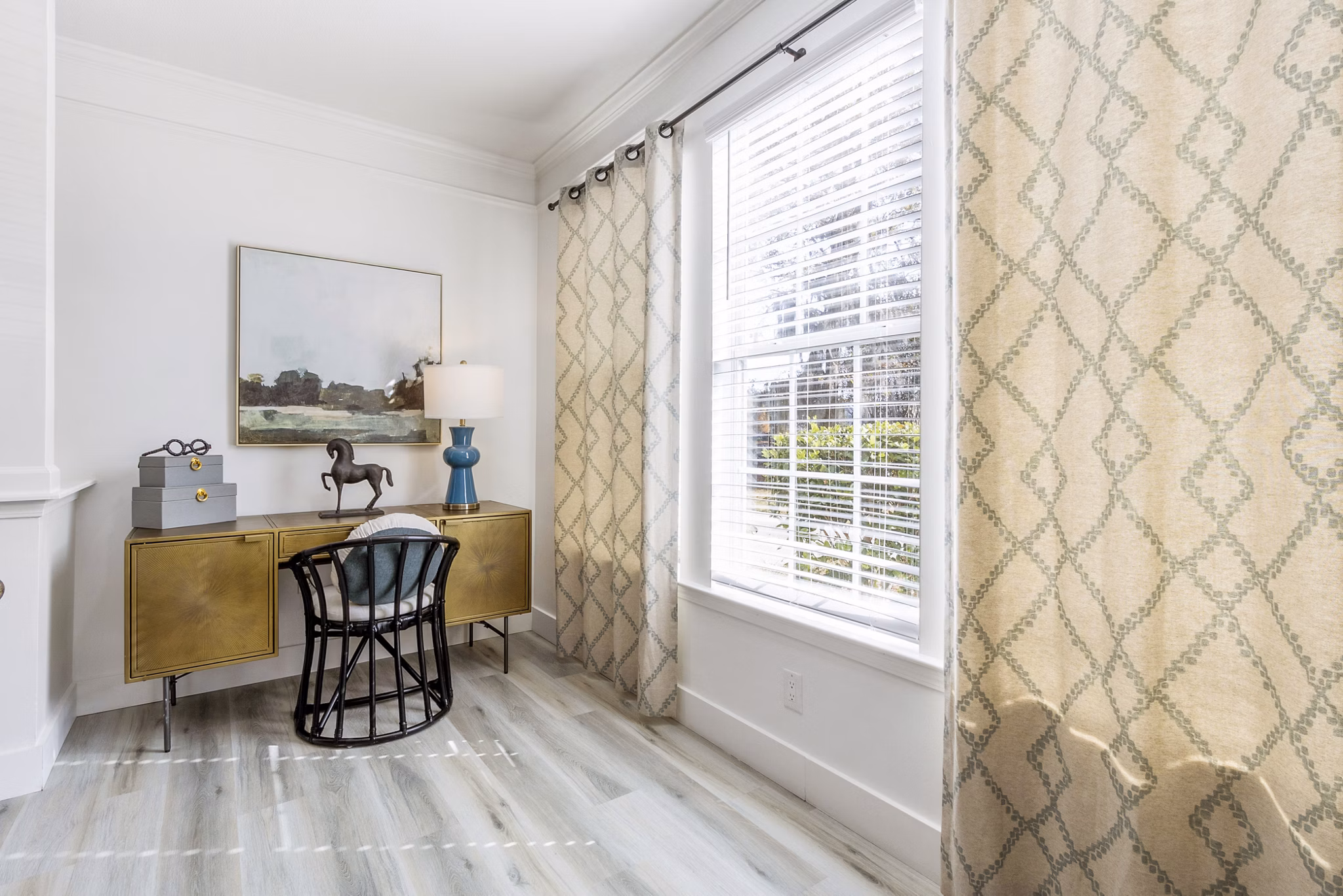 Home office with ergonomic chair and desk in The Reserve at Wescott Apartments