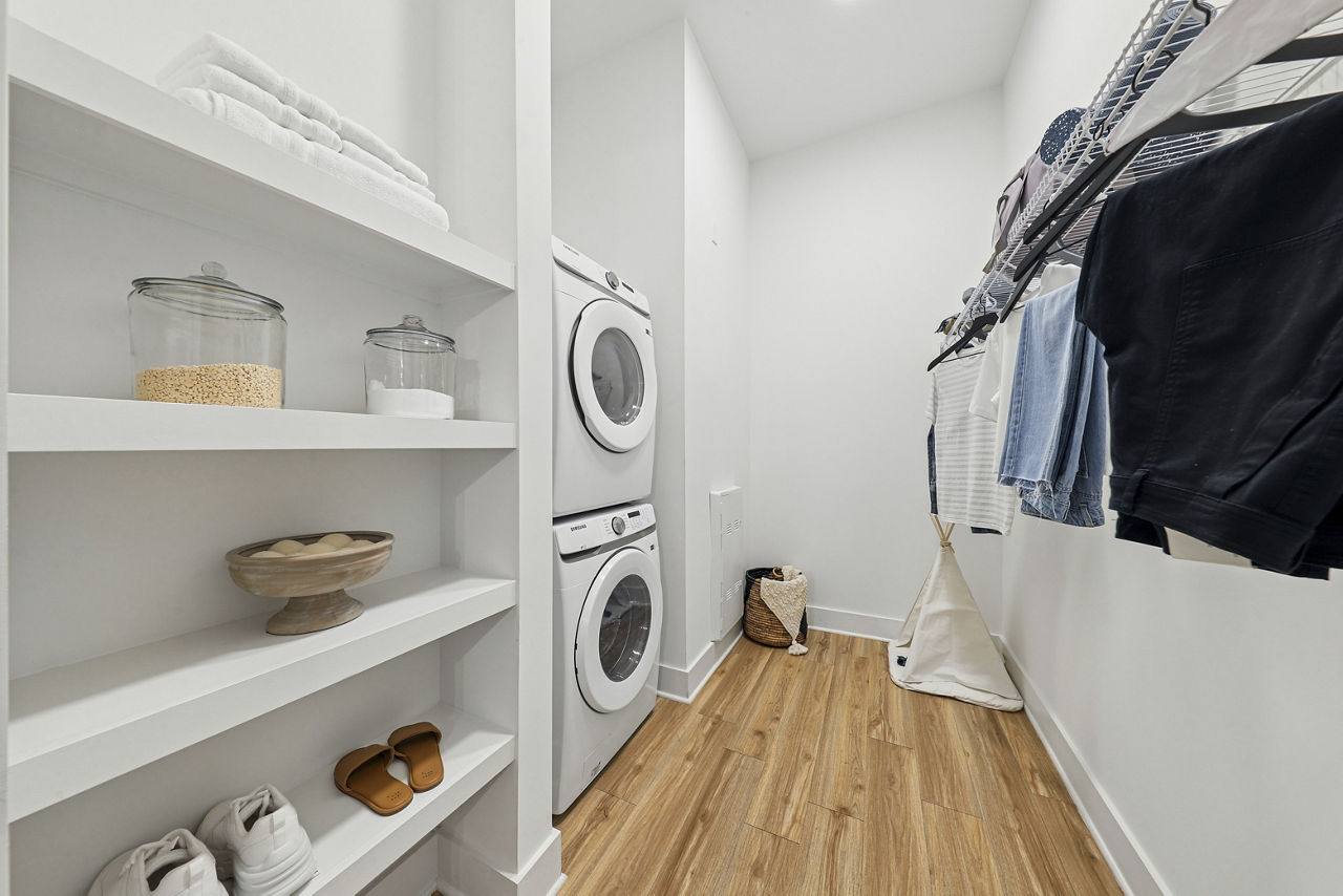 Laundry room at The Boulevard At Grant Park Apartments