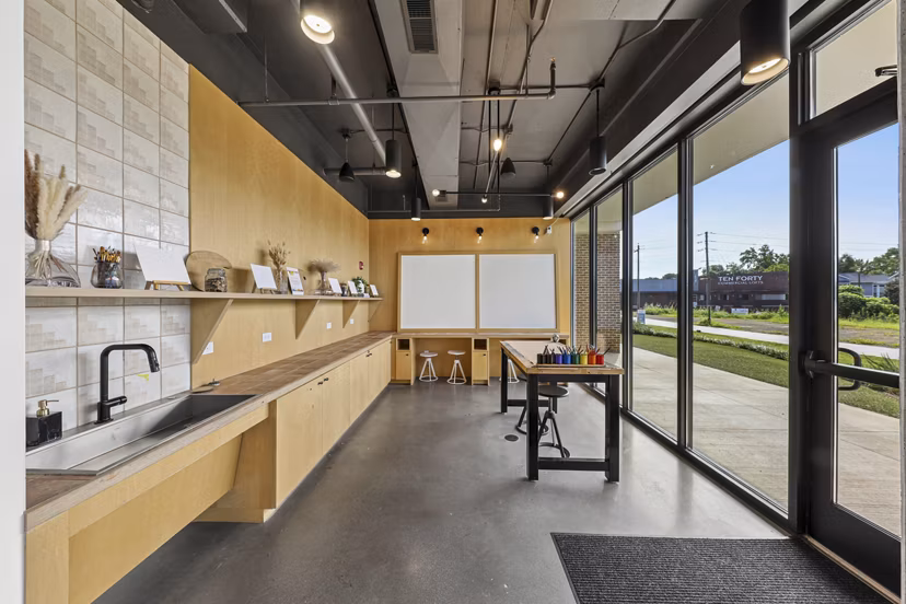 Modern clubhouse with lounge seating at The Boulevard at Grant Park Apartments