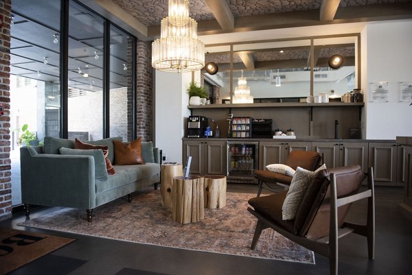 Modern clubhouse with lounge seating at The Boulevard at Grant Park Apartments