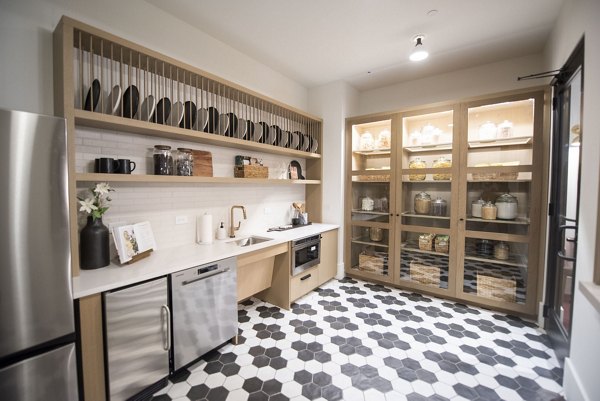 Clubhouse with modern decor and communal seating at The Boulevard at Grant Park Apartments