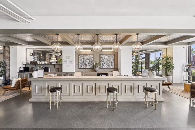 Clubhouse featuring modern design and cozy seating at The Boulevard at Grant Park Apartments in Atlanta