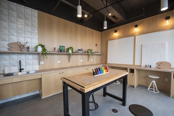 Clubhouse featuring modern design and cozy seating at The Boulevard at Grant Park Apartments in Atlanta