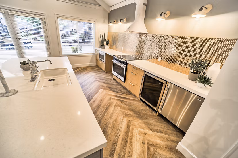 Clubhouse featuring modern interiors and seating areas at The Arden Apartments