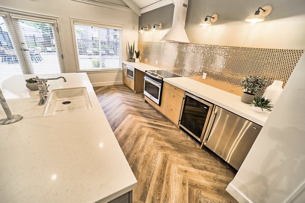Clubhouse featuring modern interiors and seating areas at The Arden Apartments