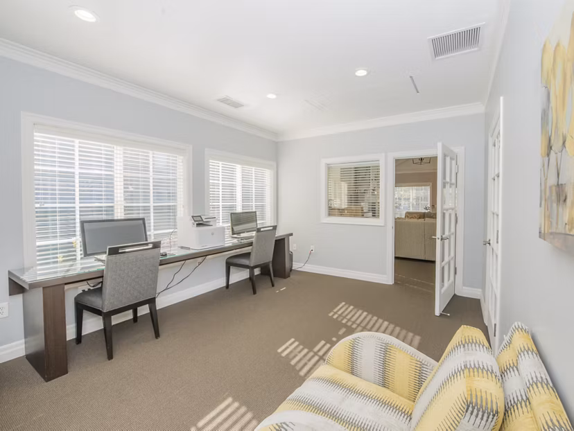 Business center with modern workstations at The Arden Apartments