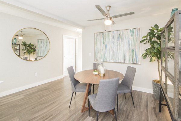 Dining area with sleek, modern furnishings at The Arden Apartments