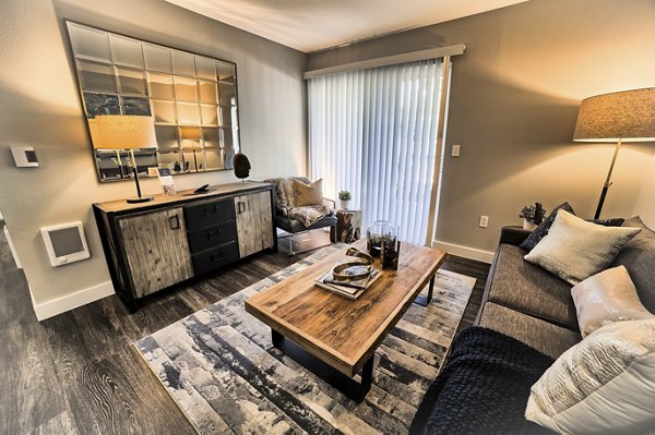 Spacious living room with modern decor in The Arden Apartments