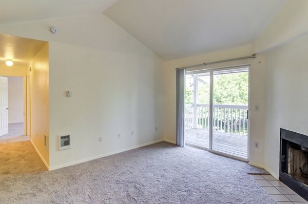Spacious living room with modern decor at The Arden Apartments