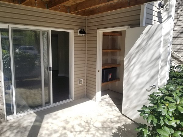 Modern patio with stylish outdoor seating at The Arden Apartments, perfect for luxury living and relaxation in a vibrant community