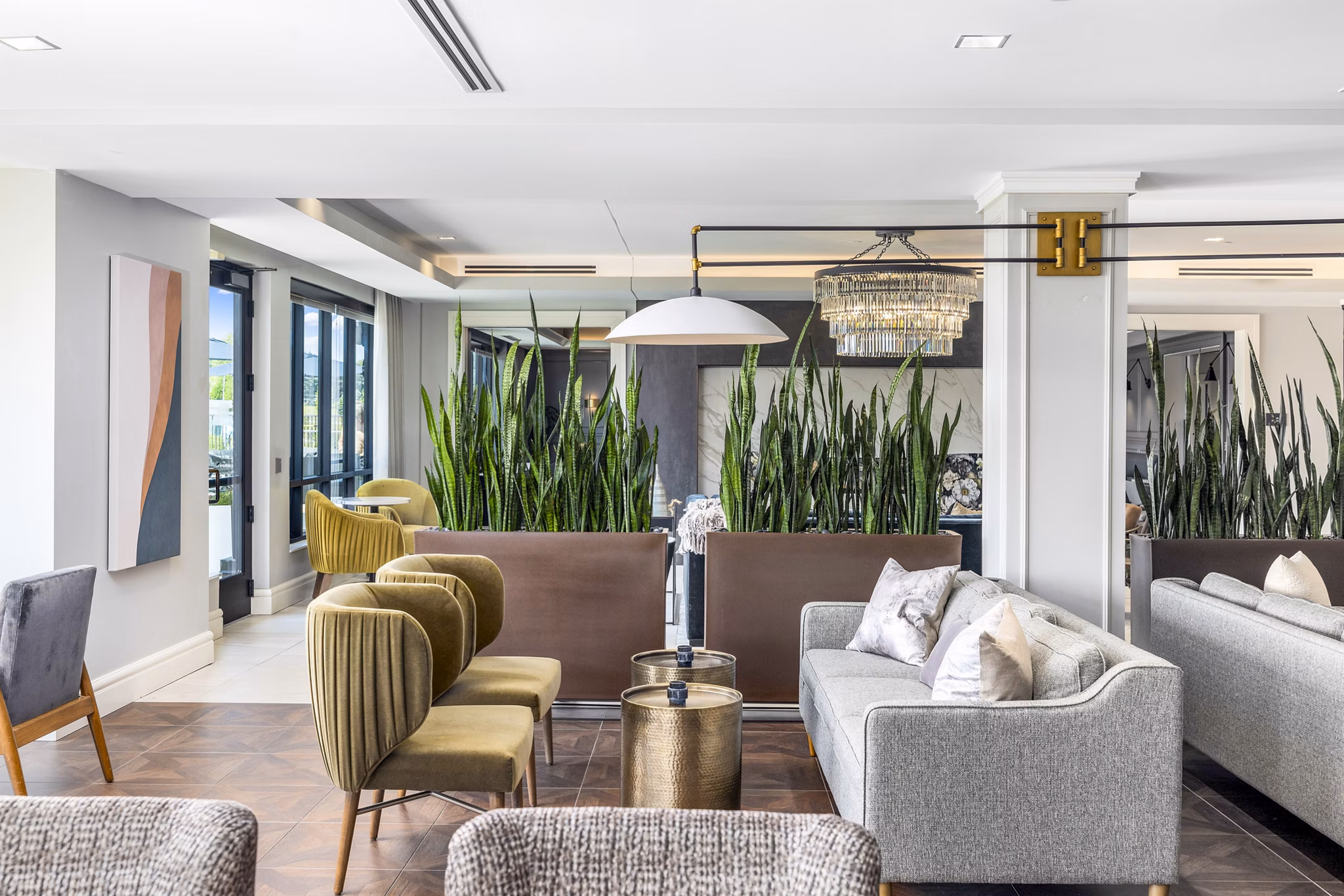 Elegant clubhouse at Avidor Omaha Apartments with modern design and plush seating