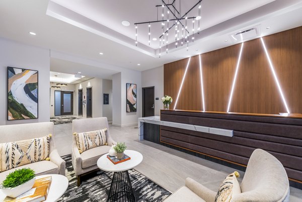 Clubhouse featuring modern decor and cozy seating at Avidor Evanston Apartments