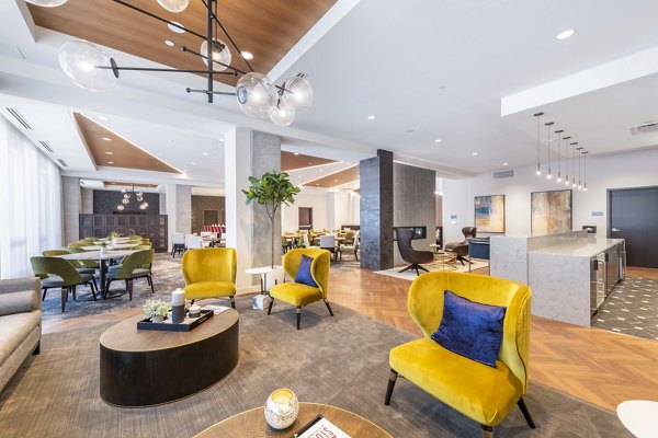 Chic clubhouse with modern furnishings at Avidor Evanston Apartments, perfect for socializing and relaxation