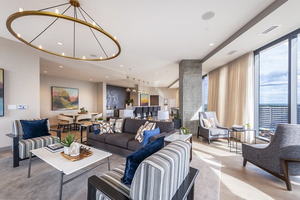 Modern clubhouse featuring chic seating and contemporary design at Avidor Evanston Apartments for luxury living and community gatherings