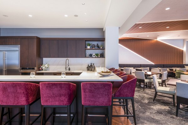 Luxurious clubhouse with modern seating and decor at Avidor Evanston Apartments