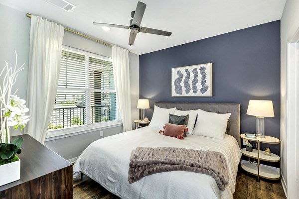 bedroom at FarmHaus Apartments