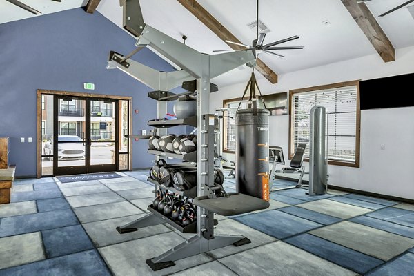 fitness center at FarmHaus Apartments