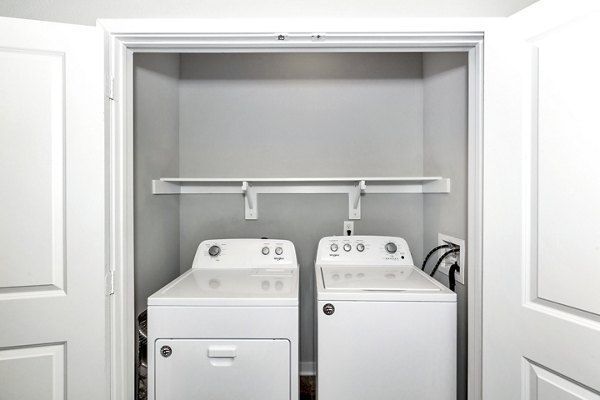 laundry room at FarmHaus Apartments
