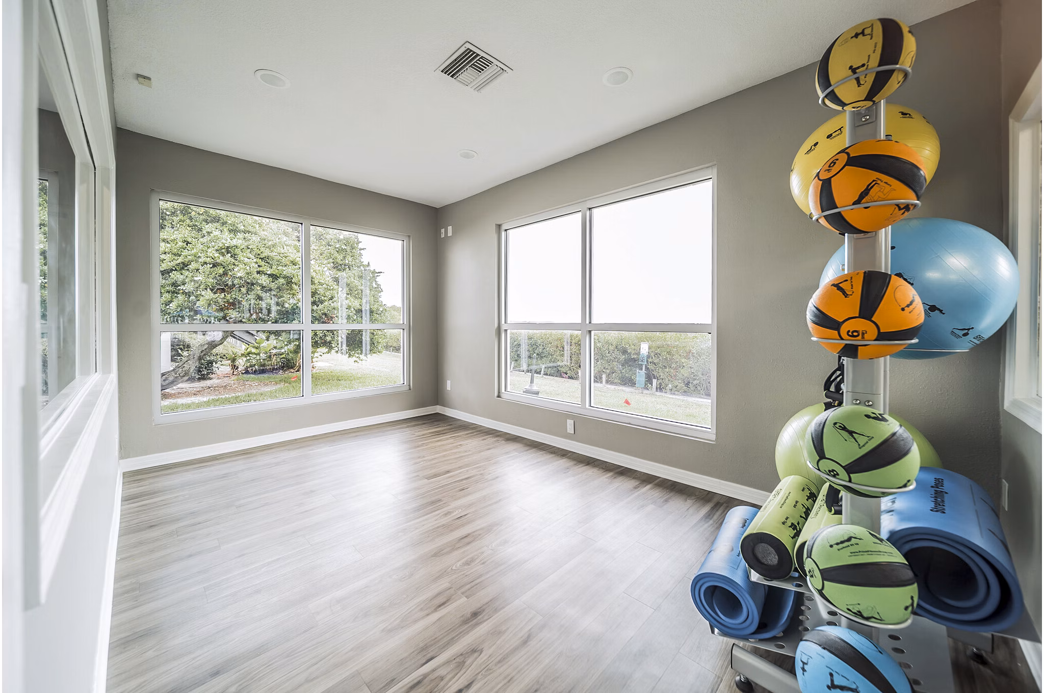 Yoga studio featuring calming decor and natural light at Bay Cove Apartments