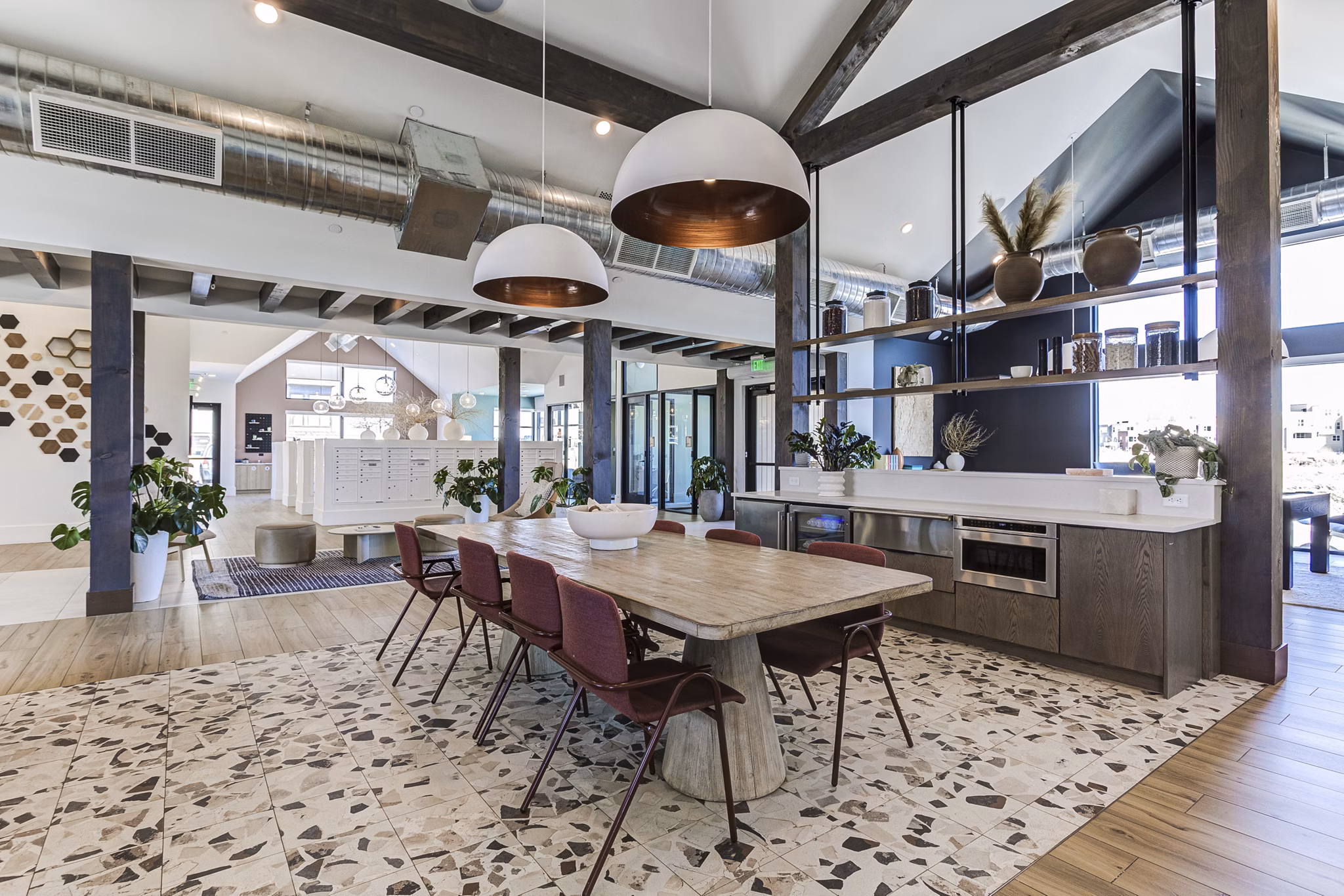 Clubhouse featuring modern decor and comfortable seating at Novel Daybreak Apartments in Greystar luxury community