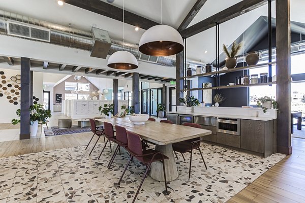Clubhouse featuring modern decor and comfortable seating at Novel Daybreak Apartments in Greystar luxury community